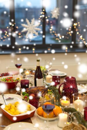 food and drinks on christmas table at homeの写真素材