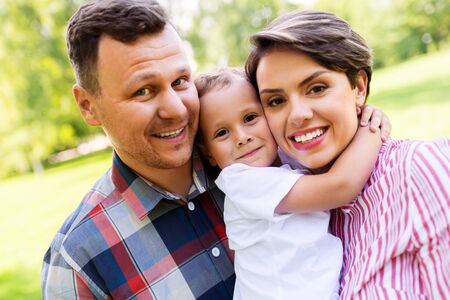 happy family at summer park