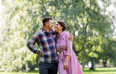 happy couple in summer park