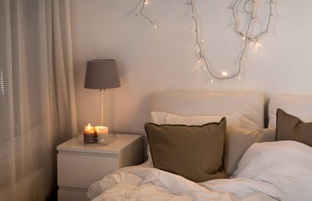 sofa with cushions at cozy home living roomの写真素材