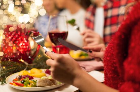 close up of friends having christmas dinnerの写真素材
