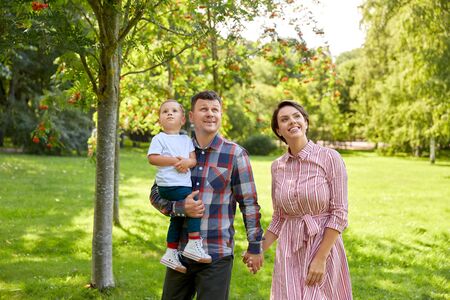 happy family at summer park