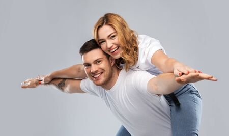 happy couple in white t-shirts having fun