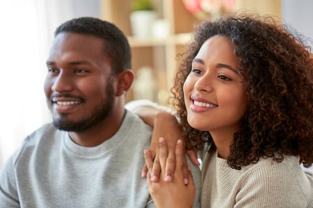 Happy african american couple at home