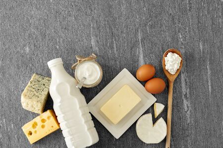 different kinds of cheese, milk, yogurt and butterの写真素材