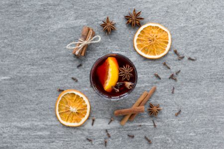 hot mulled wine, orange slices, raisins and spicesの写真素材