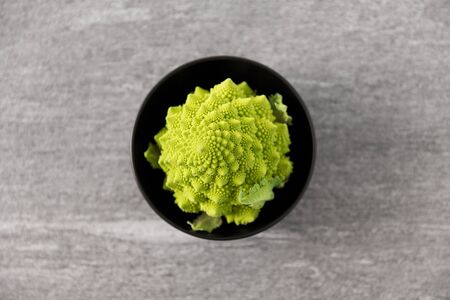 close up of romanesco broccoli in bowlの写真素材