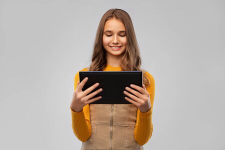 teenage girl using tablet computerの写真素材