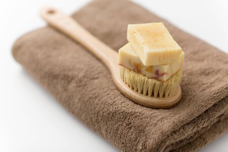 crafted soap bars, natural brush and bath towel