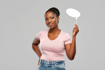 happy african american woman holding speech bubble