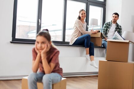 sad girl moving to new home with her family