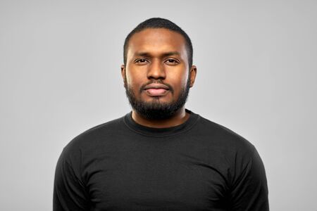 portrait of african american man in black t-shirt