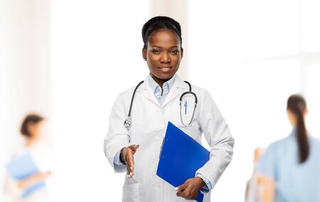 happy african american female doctor or scientistの写真素材