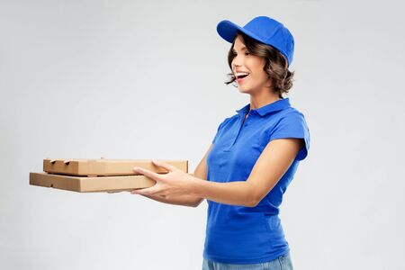 delivery woman with takeaway pizza boxes