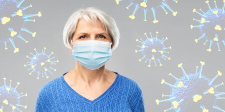 senior woman in protective medical mask