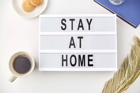 lightbox with stay at home caution words