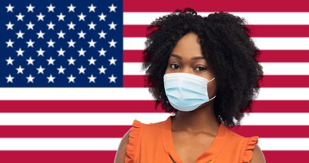 african american woman in protective medical maskの写真素材