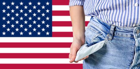 close up of woman showing empty pocketsの写真素材