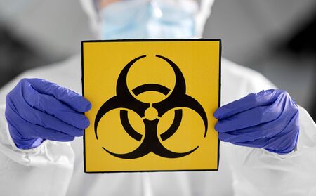doctor in protective wear, mask and face shieldの写真素材