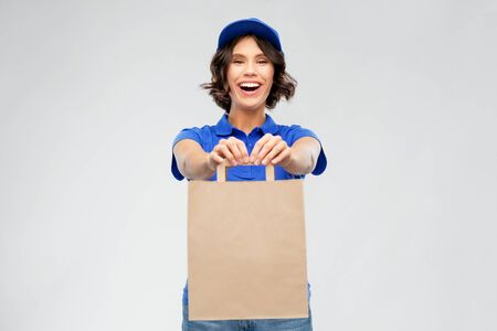 delivery woman with takeaway food in paper bag