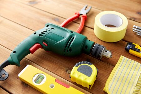different work tools on wooden boards