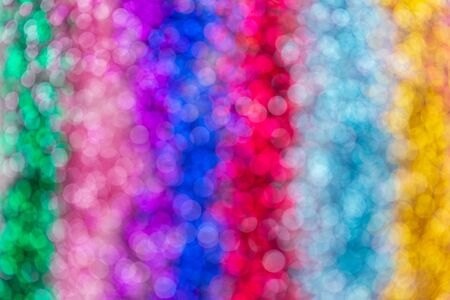 multicolored glitters or sequins bokeh background