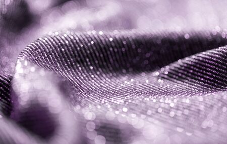 shimmering violet fabric backgroundの写真素材