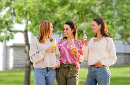 young women with non alcoholic drinks talking