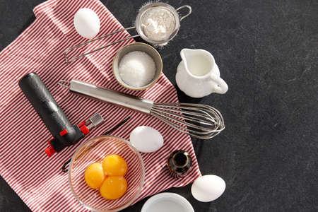 whisk, eggs, sugar, milk, flour and vanillaの写真素材