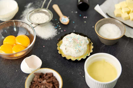 baking dish with dough and cooking ingredientsの写真素材