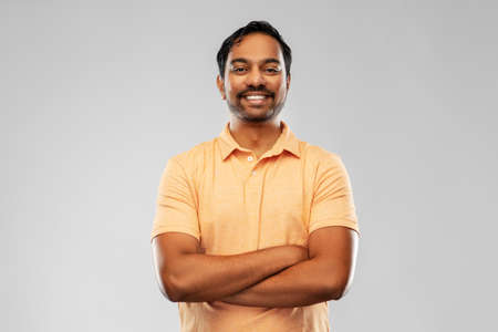 portrait of happy smiling young indian manの写真素材