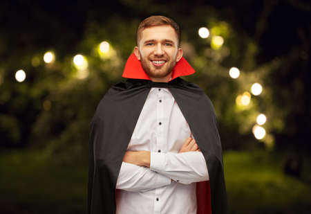 happy man in halloween costume of vampireの写真素材