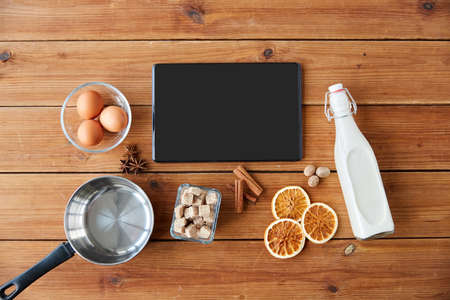 tablet pc, ingredients for eggnog cookingの写真素材