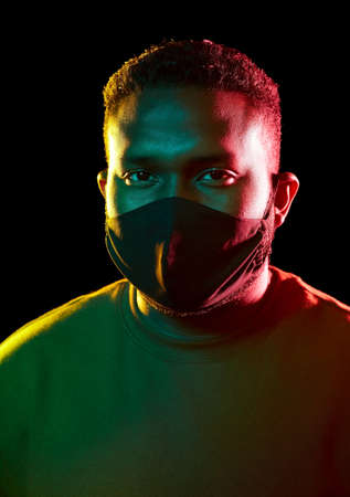 african american man wearing black reusable mask