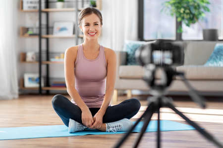 woman or sports blogger streaming online at home