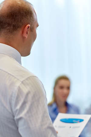 close up of business team with papers at office