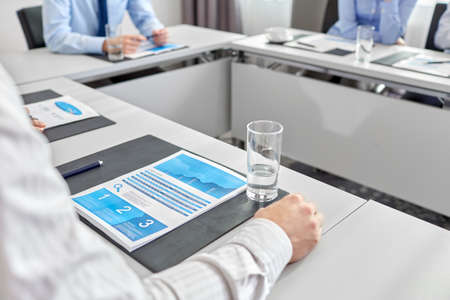 business team with papers meeting at office