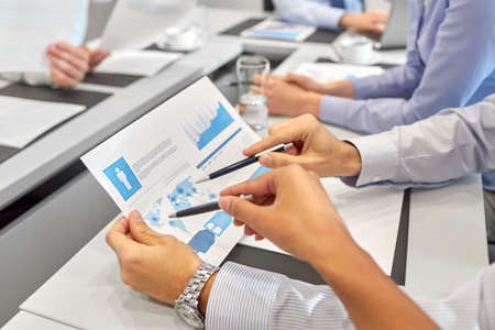 business team with papers meeting at office
