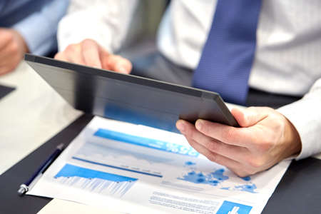 businessman with tablet pc computer at office