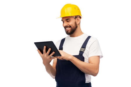 happy male worker or builder with tablet computer