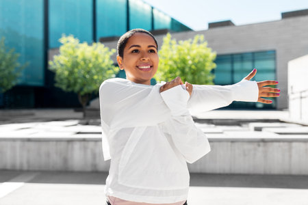 african american woman doing sports outdoors