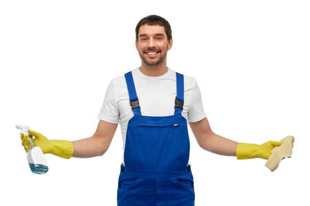 male cleaner cleaning with rag and detergentの写真素材