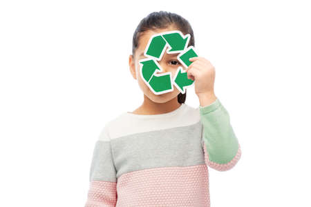 smiling girl holding green recycling signの写真素材
