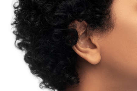 close up of african american womans ear