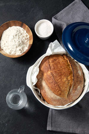 bread, wheat flour, salt and water in glass jug