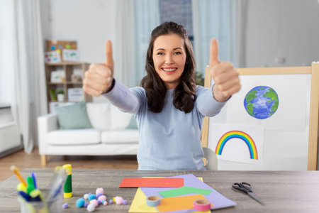 teacher having online class of arts and crafts