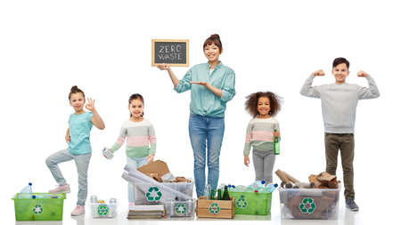 happy woman with little children sorting wasteの写真素材