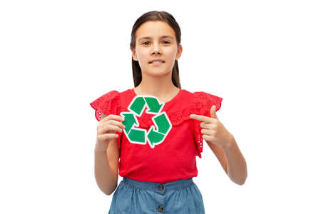 smiling girl holding green recycling signの写真素材