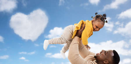 happy african american father with baby daughterの写真素材