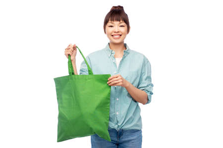 woman with reusable canvas bag for food shopping